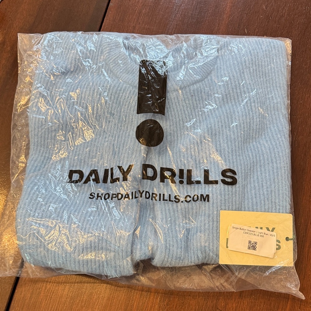Daily Drills single button sweater